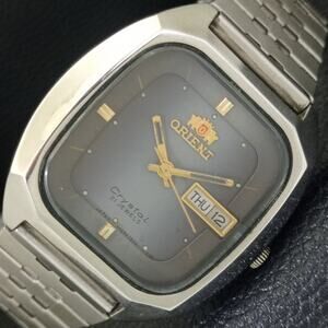 Vintage 1972 Square Orient Automatic Mens Silver Watch W/daydate & Blue accents